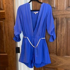 Blue romper with gold chain belt